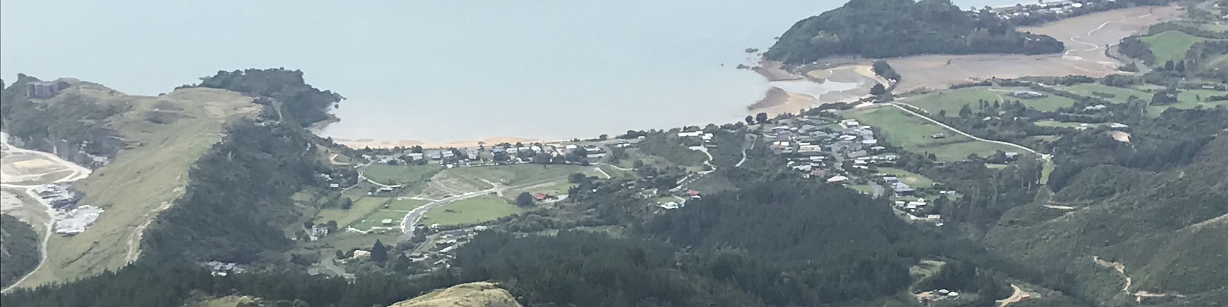 Ligar Bay and its settlement seen from the hills above
